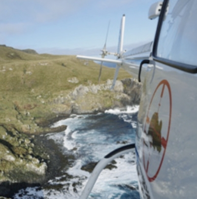 Final drop: Helicopter dropping bait across Antipodes Island.