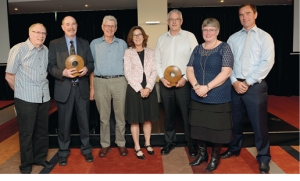 Awards: From left: Ian Gunn (Greater Wellington), Ross Cottle (DUNZ), Verne Brassel Kaiwaiwai Dairies, and awards presenter Rebecca Macfie (Listener journalist). The names of other category winners shown were unavailable.