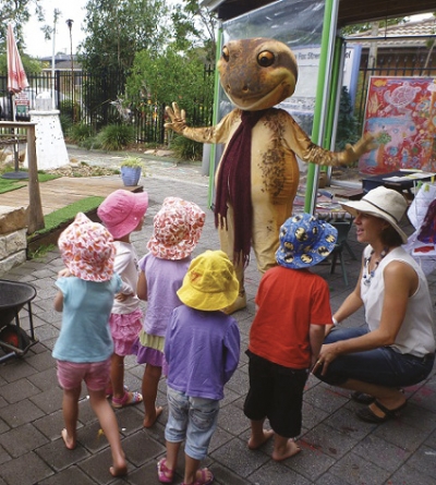 Attention getter: Children at Fox St Pre School, Ballina, get a friendly visitor to celebrate the  launch of WetlandCare Australia’s Wetland Discovery Programme.