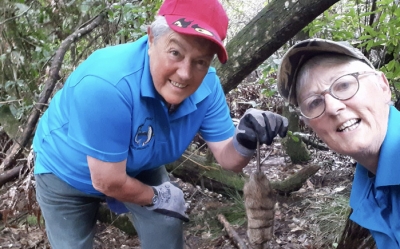 hris Pritt, left, and Lesley Hosking checking traps on the Hinemaiaia River.